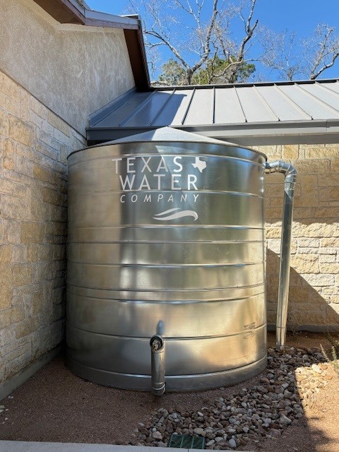 a cistern with a Texas Water company logo