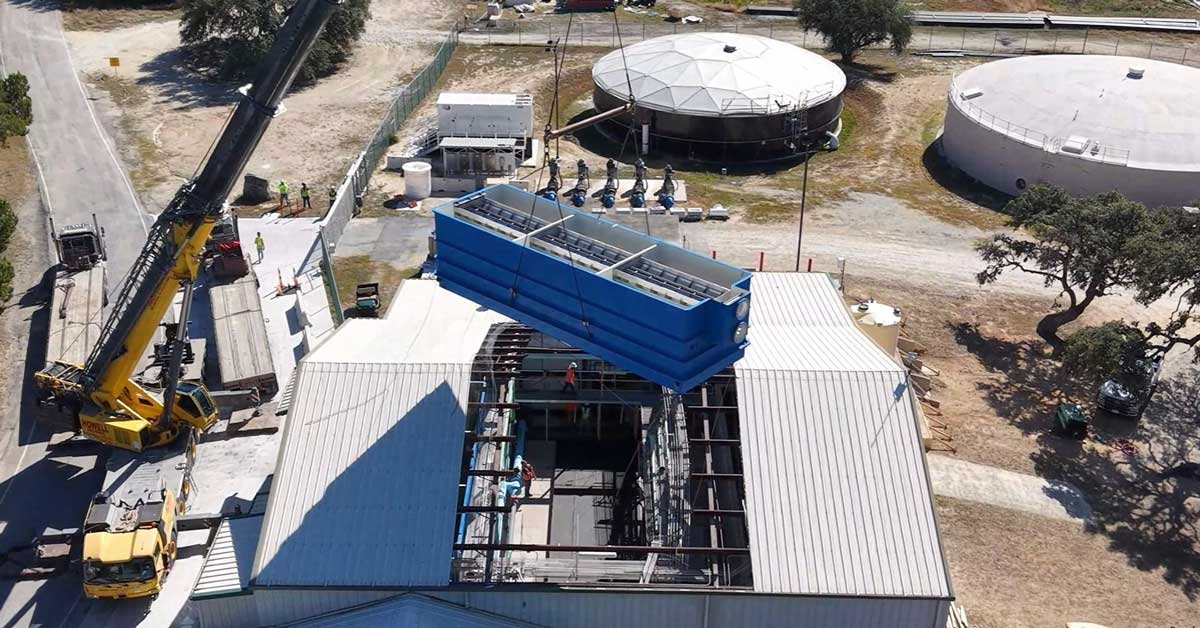 A new filter gets installed at Park Shores.