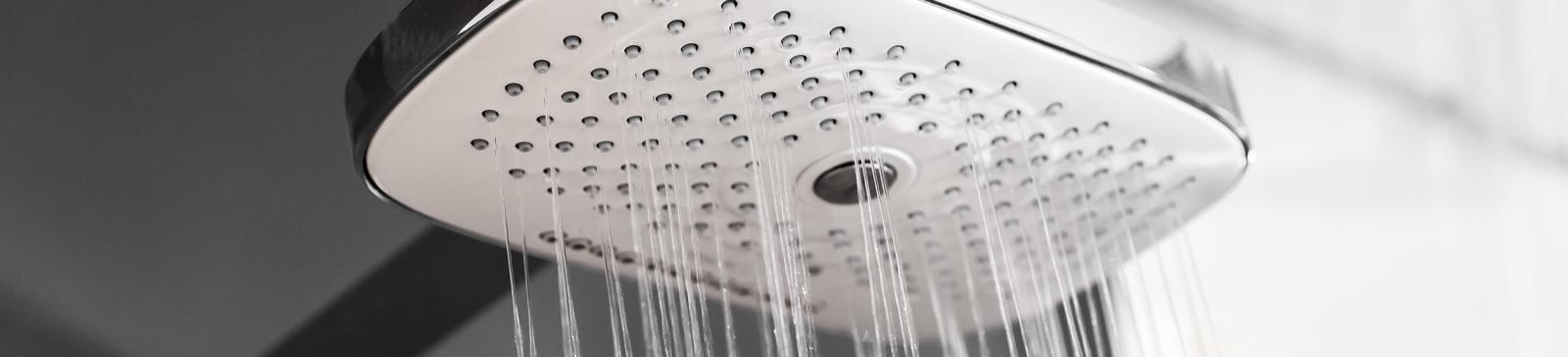 a rain shower head with water coming out of it